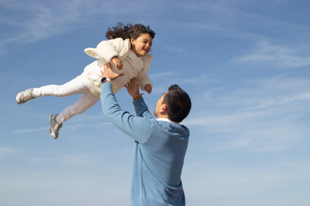 Happy father and daughter travelling together